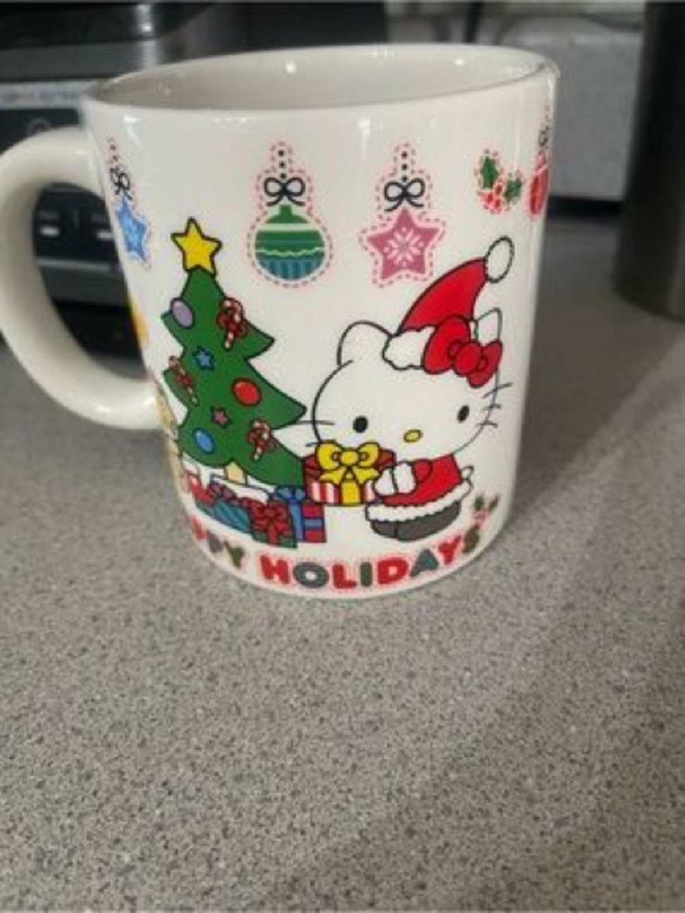 Hello Kitty Holiday Ceramic Mug — White with Red, Green, Yellow Accents